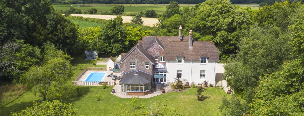 A large holiday cottage with swimming pool and conservatory