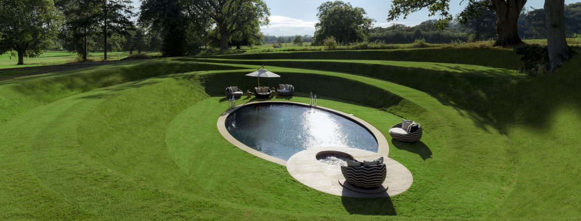 Green landscape and pond