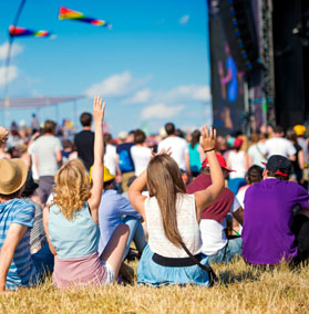 People enjoying a music festival.