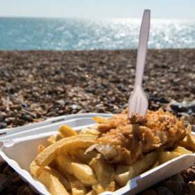 Fish and Chips take away meal enjoyed on the beach.