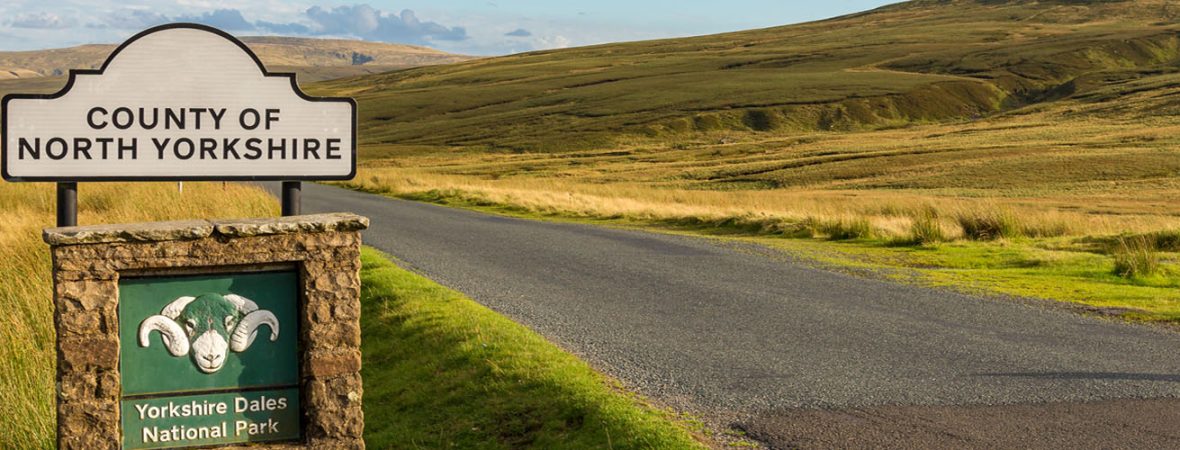 Signpost for County of North Yorkshire and Yorkshire Dales National Park.