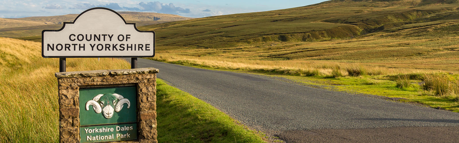 Signpost for County of North Yorkshire and Yorkshire Dales National Park.