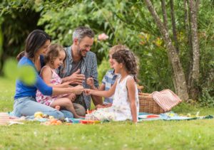 Family picnic on a sunny day.