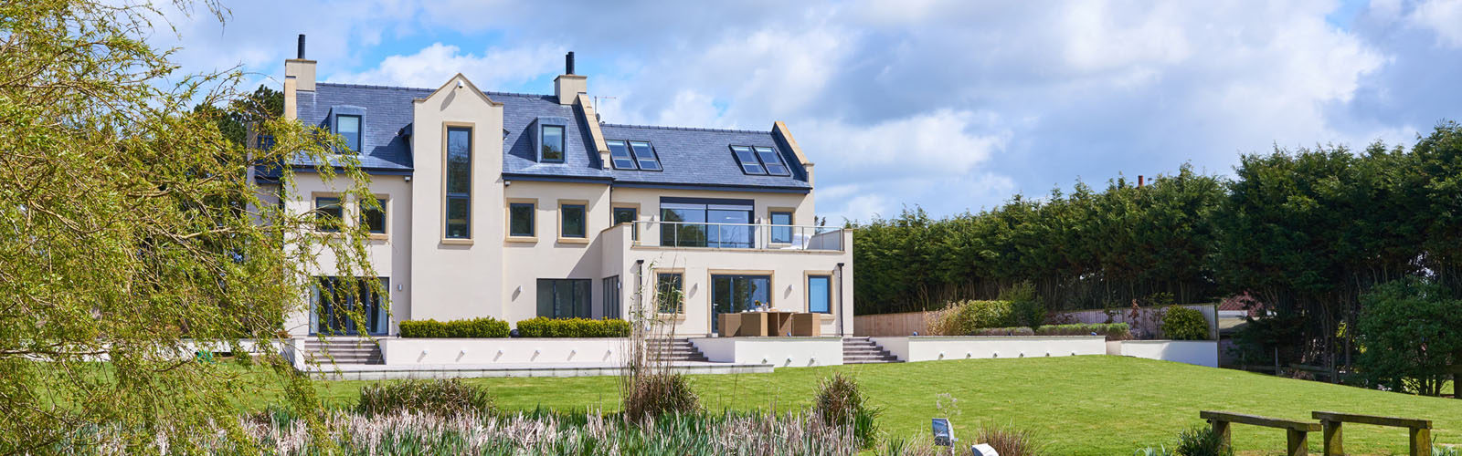 Large house with a beautiful garden.