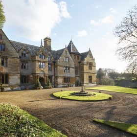 Manor house with a grand drive in Northamptonshire.