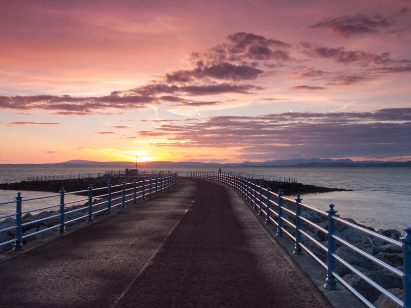 Sunset on the pier in Morecambe.