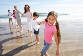 Family enjoying a day on the beach.