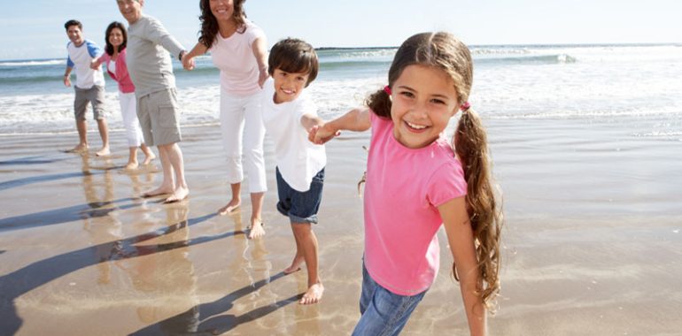 Family enjoying a day on the beach.