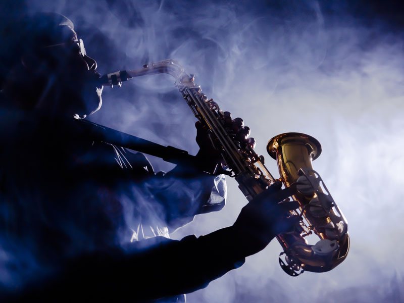 Jazz musician playing the saxophone.