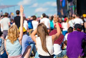 People enjoying music festival.