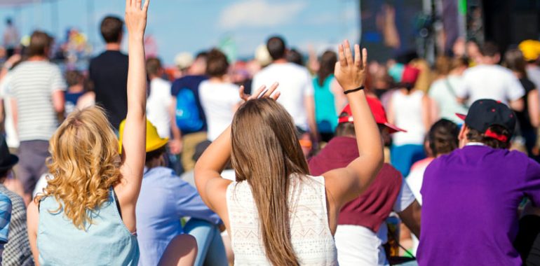 People enjoying music festival.