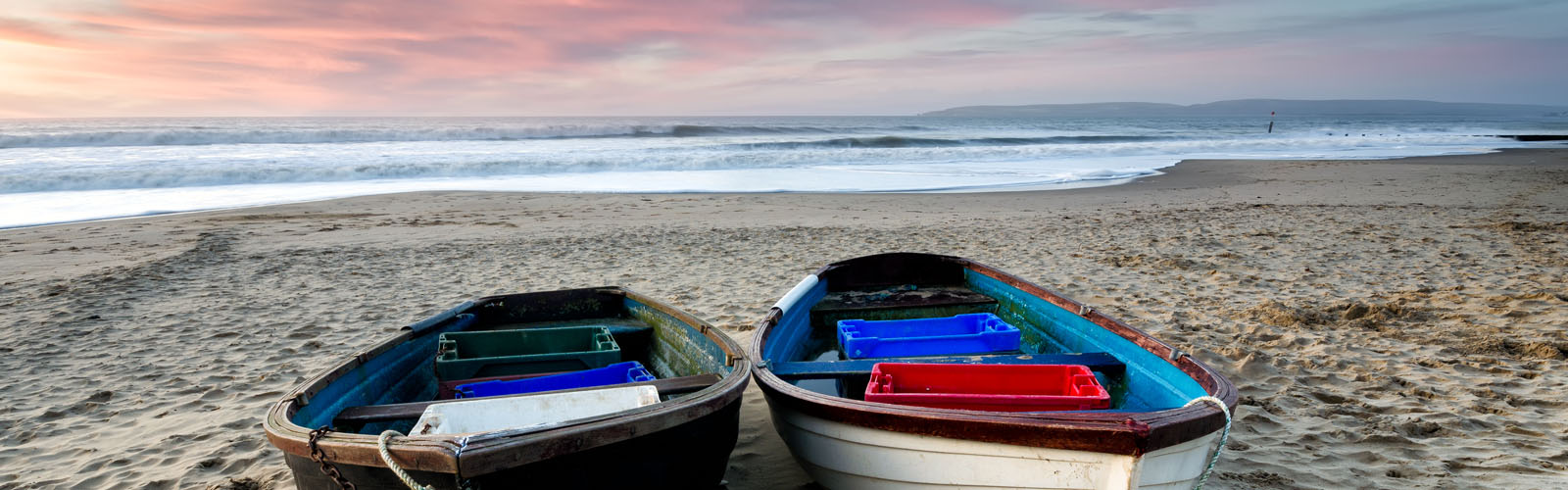 Fishing boats on the beach in Dorset.