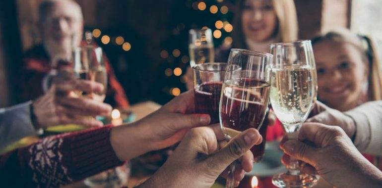 Family and friends having a drink on new year's day.