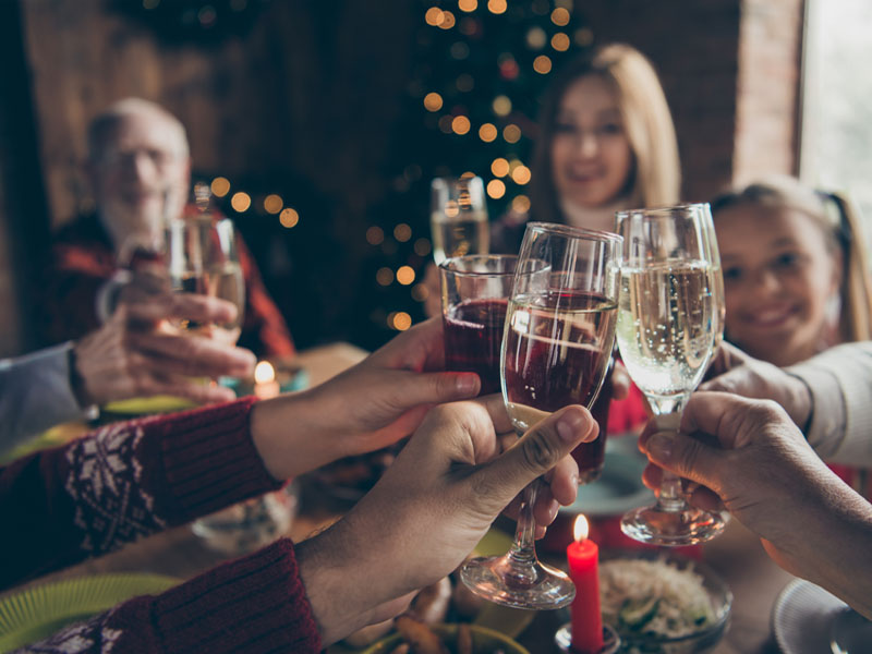 Family and friends having a drink on new year's day.