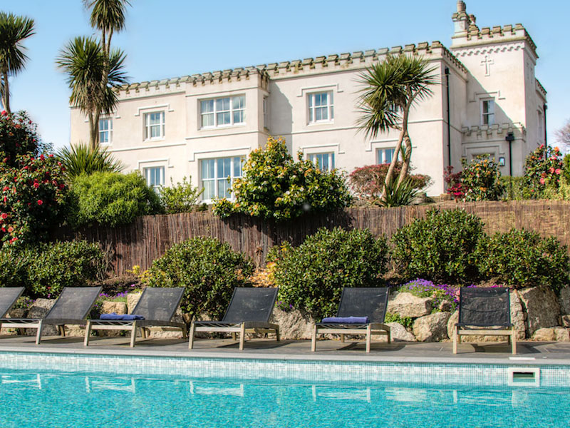 Large house with a swimming pool.