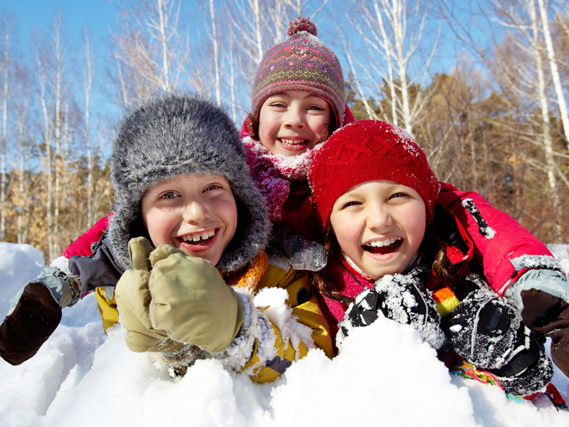 kids playing in the snow.